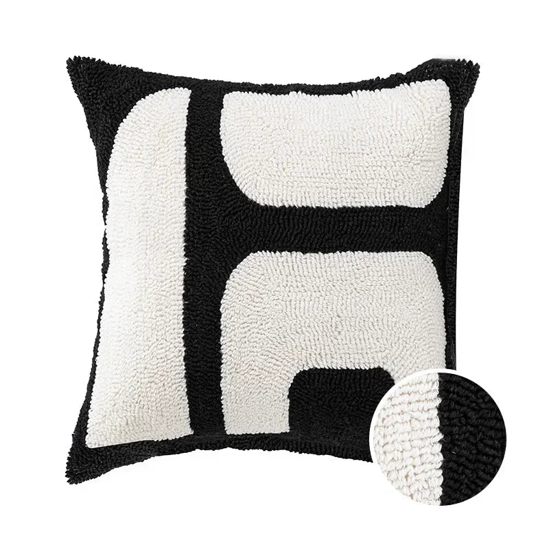 Minimalist black and white throw pillow covers with splicing.