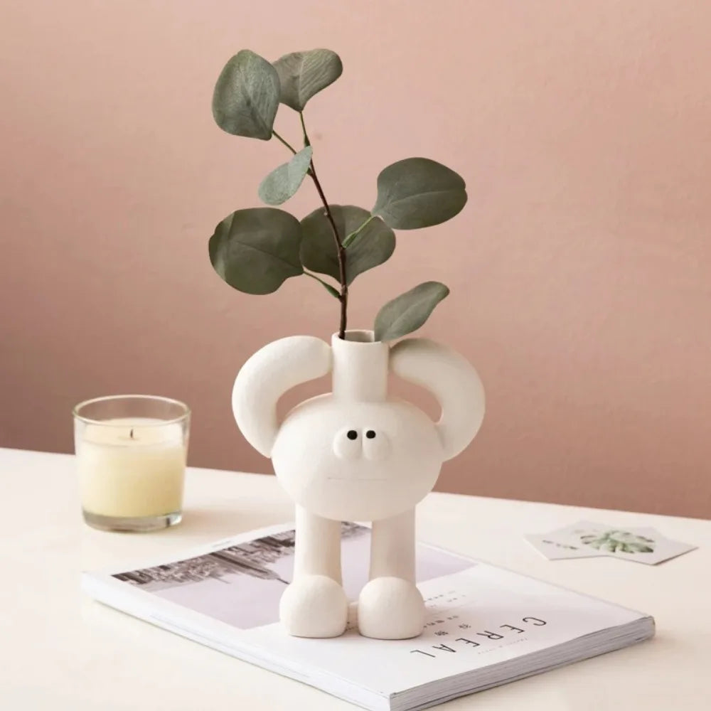 Abstract resin knot vase centerpiece for living rooms and dining tables.