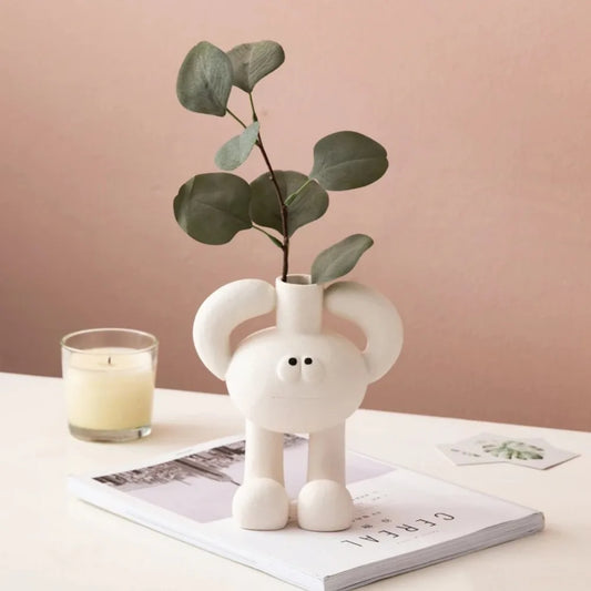 Abstract resin knot vase centerpiece for living rooms and dining tables.