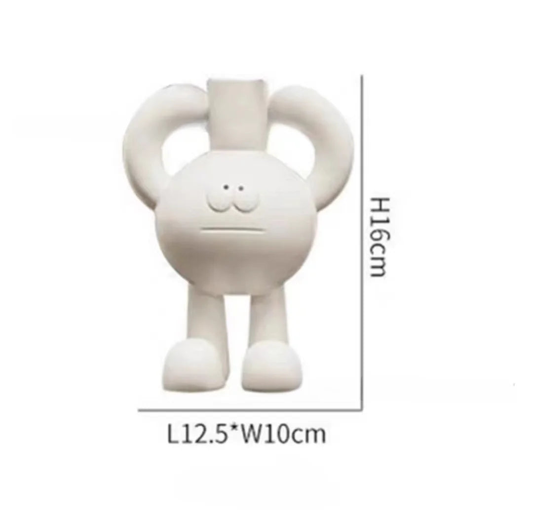 Decorative resin tabletop vases with unique artistic designs.