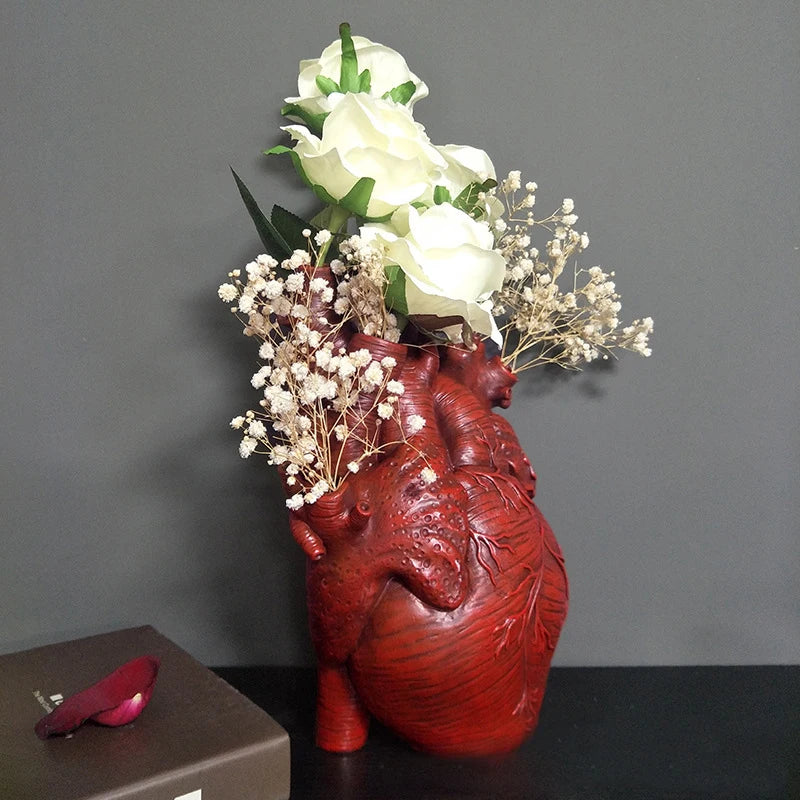 Contemporary anatomical heart vase for office decoration.