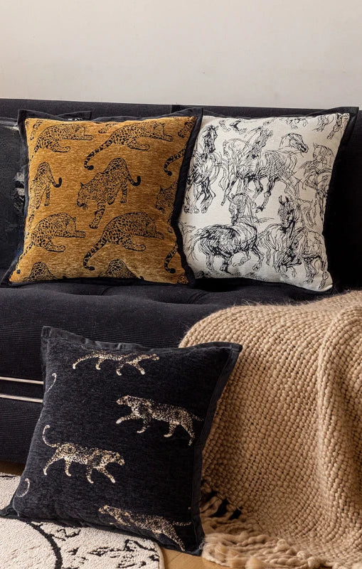 White pillow cover with black horse sketch design.