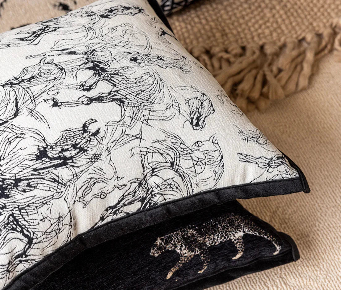 Decorative throw pillow with artistic leopard design.