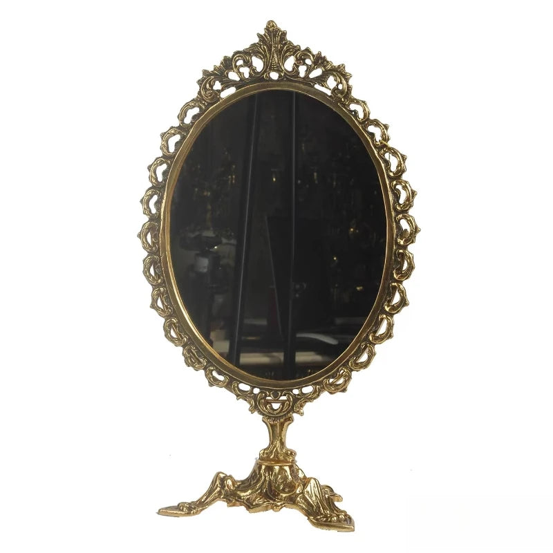 Vintage royal oval mirror for bedroom and vanity décor.