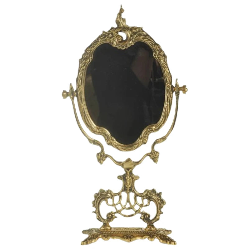 Oval wall mirror with handcrafted resin frame in gold.