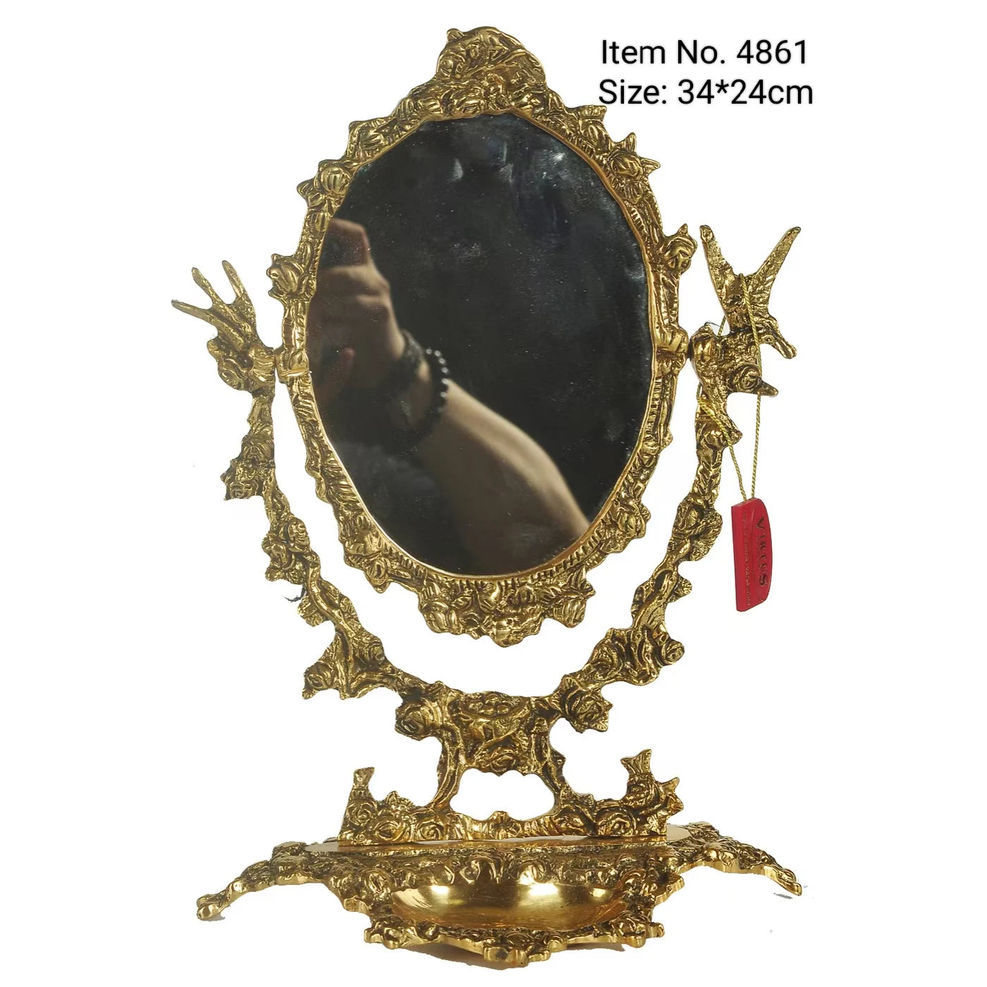 Ornate tabletop gold mirror with royal decorative pattern.