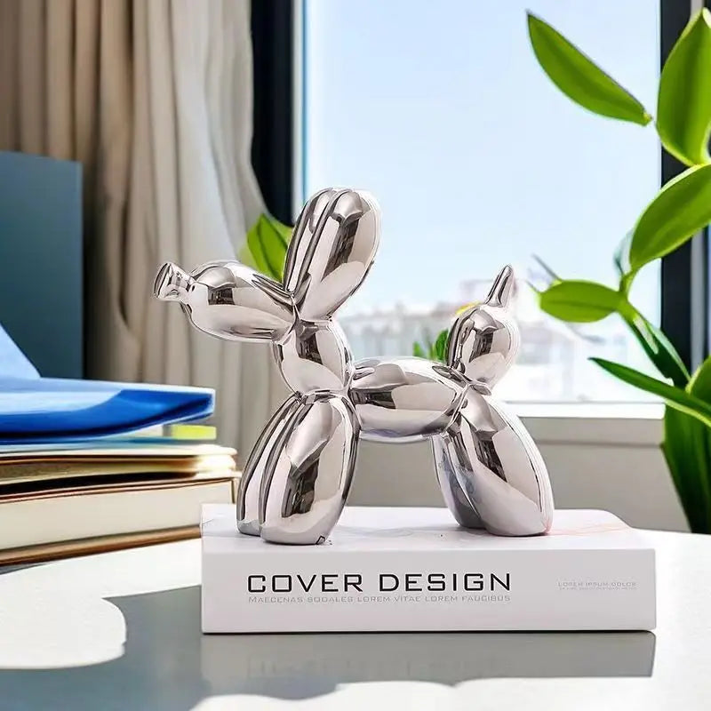 Glossy enamel balloon dog figurine as bookshelf decor.
