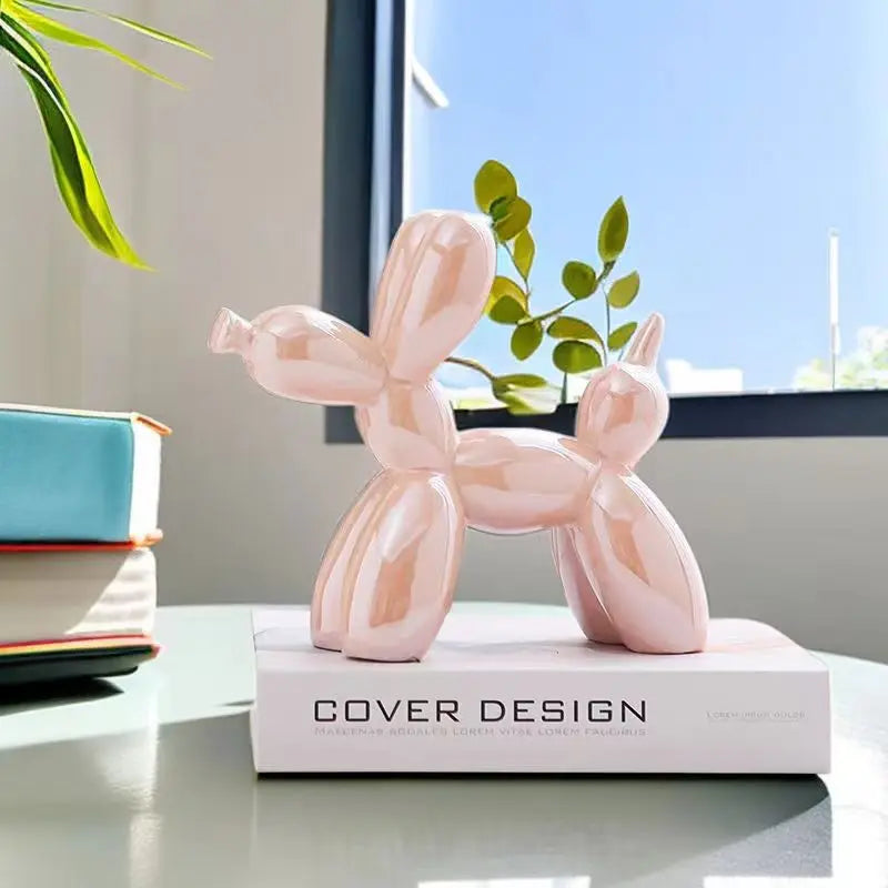 Pink balloon dog figurine gift for home and office decoration.