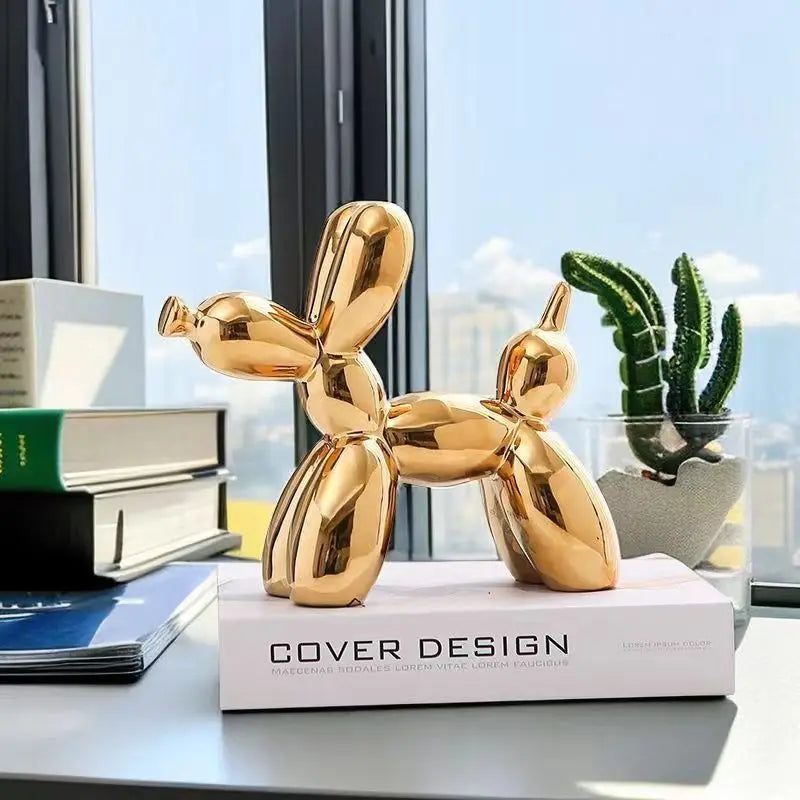 Metallic gold balloon dog sculpture centerpiece for coffee table.
