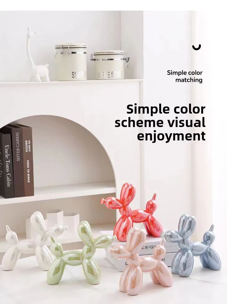 Ceramic balloon dog ornament for nursery or office shelf.