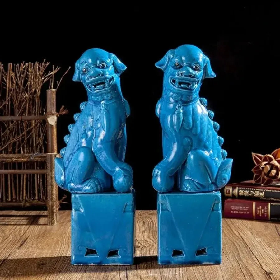 Blue porcelain Foo Dog guardian lion statues pair.