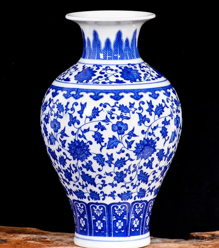Blue porcelain vase with white glaze and floral motif.