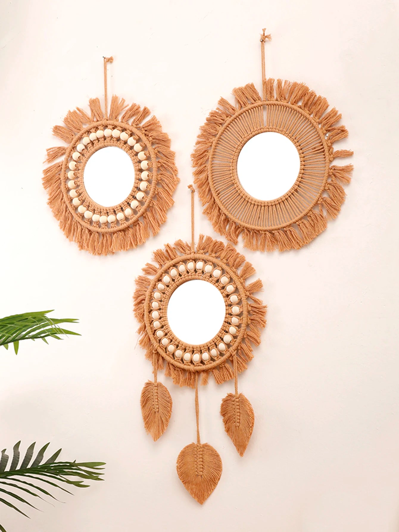 Handcrafted cotton macrame mirror for bedroom decoration.