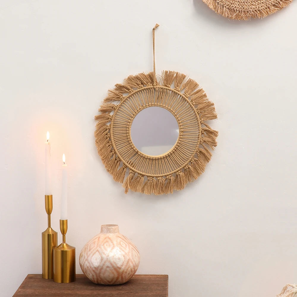 Sunburst woven mirror for boho living room wall décor.