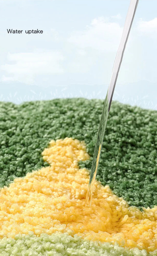 Adorable cartoon frog mat with soft microfiber surface.