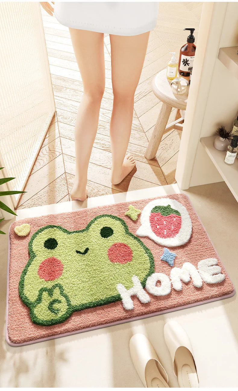 Home Frog non-slip microfiber bath mat with “Home” text.