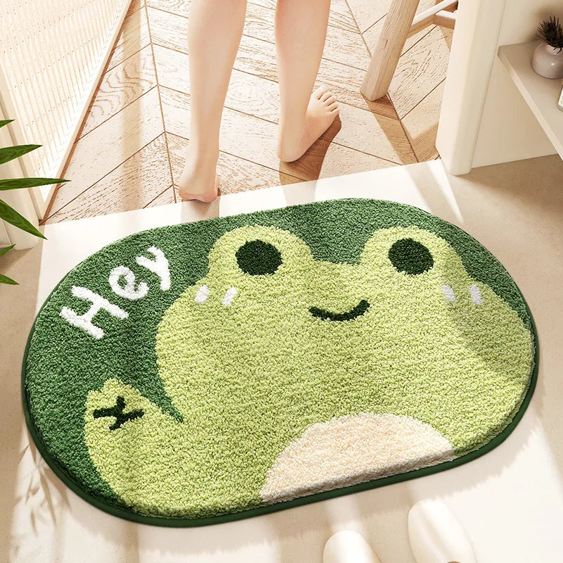 Cute green Hey Frog bath mat for kids bathroom decor.