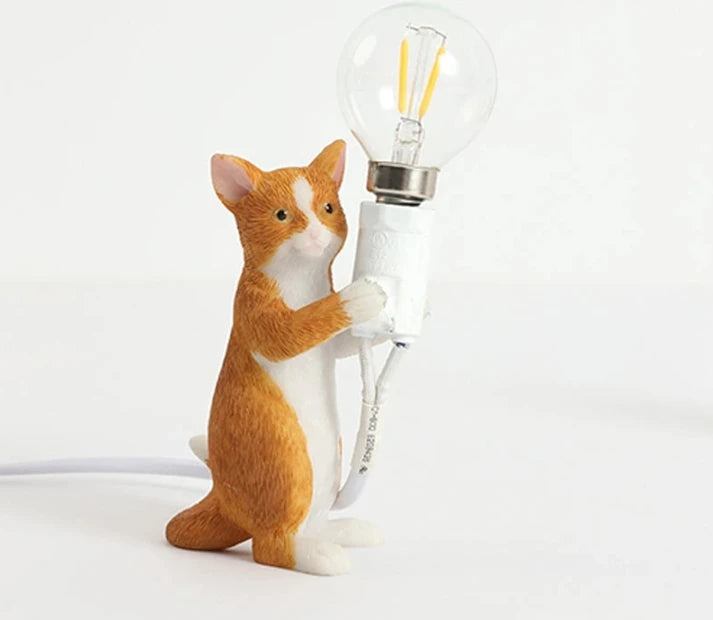 Modern resin cat figurine lamp with LED bulb.