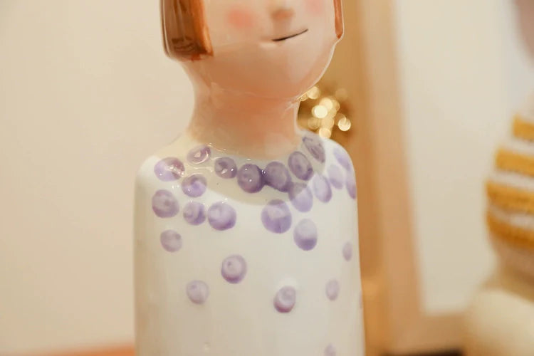 Decorative ceramic vases for living room arrangement.