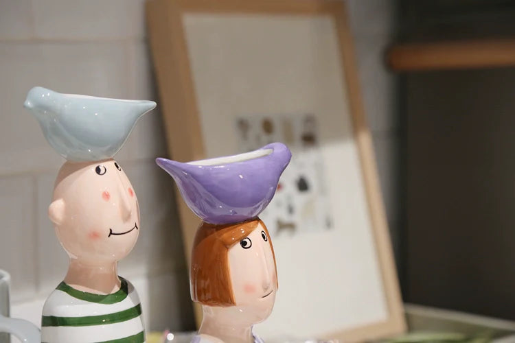 Ceramic couple tabletop vases for office or home décor.