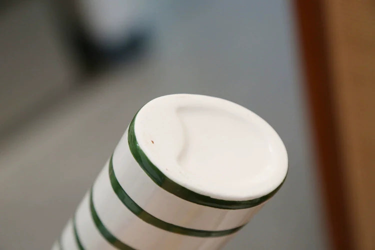 Boy and girl ceramic vases as unique wedding décor.