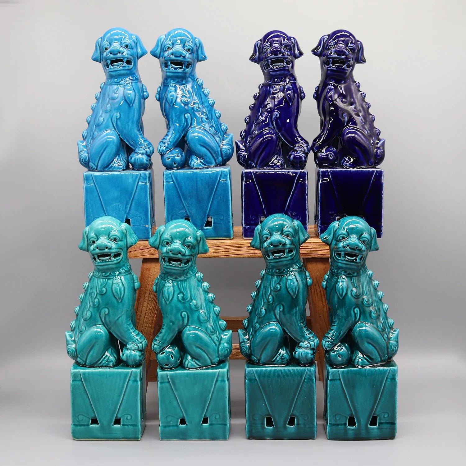 Pink Foo Dogs ceramic statues Chinese guardian lions.