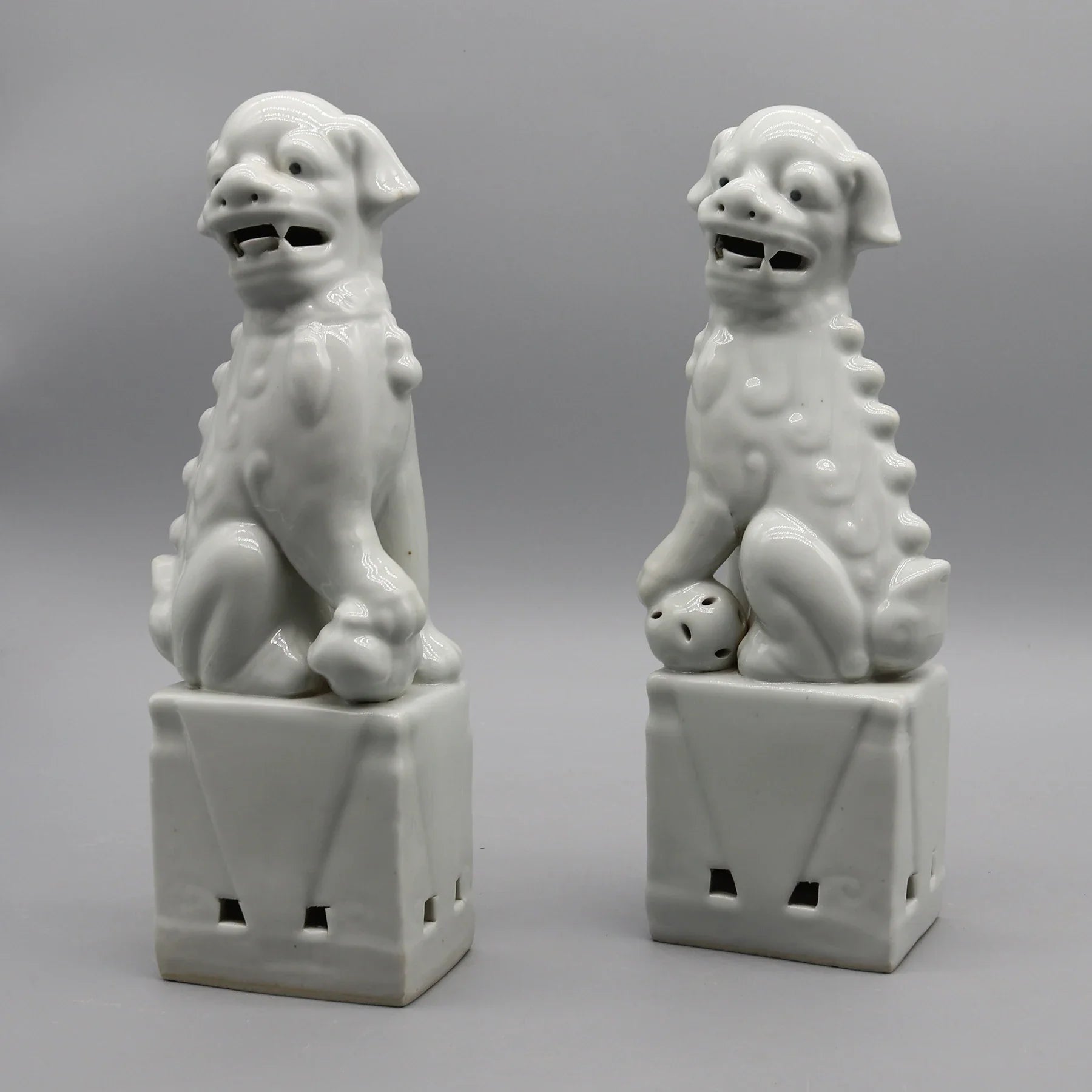 Cream Foo Dogs pair ceramic guardian sculptures.