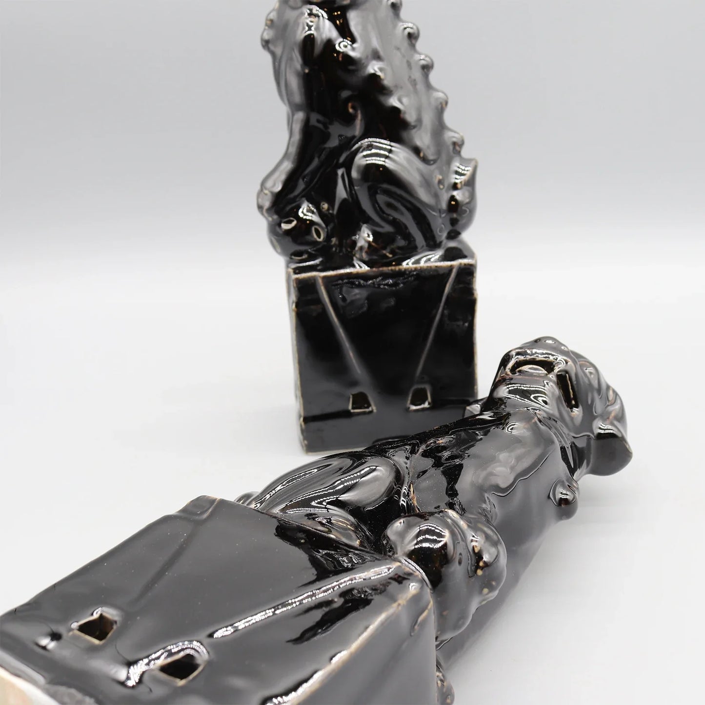 Black ceramic Foo Dogs luxury Chinese guardian lions.