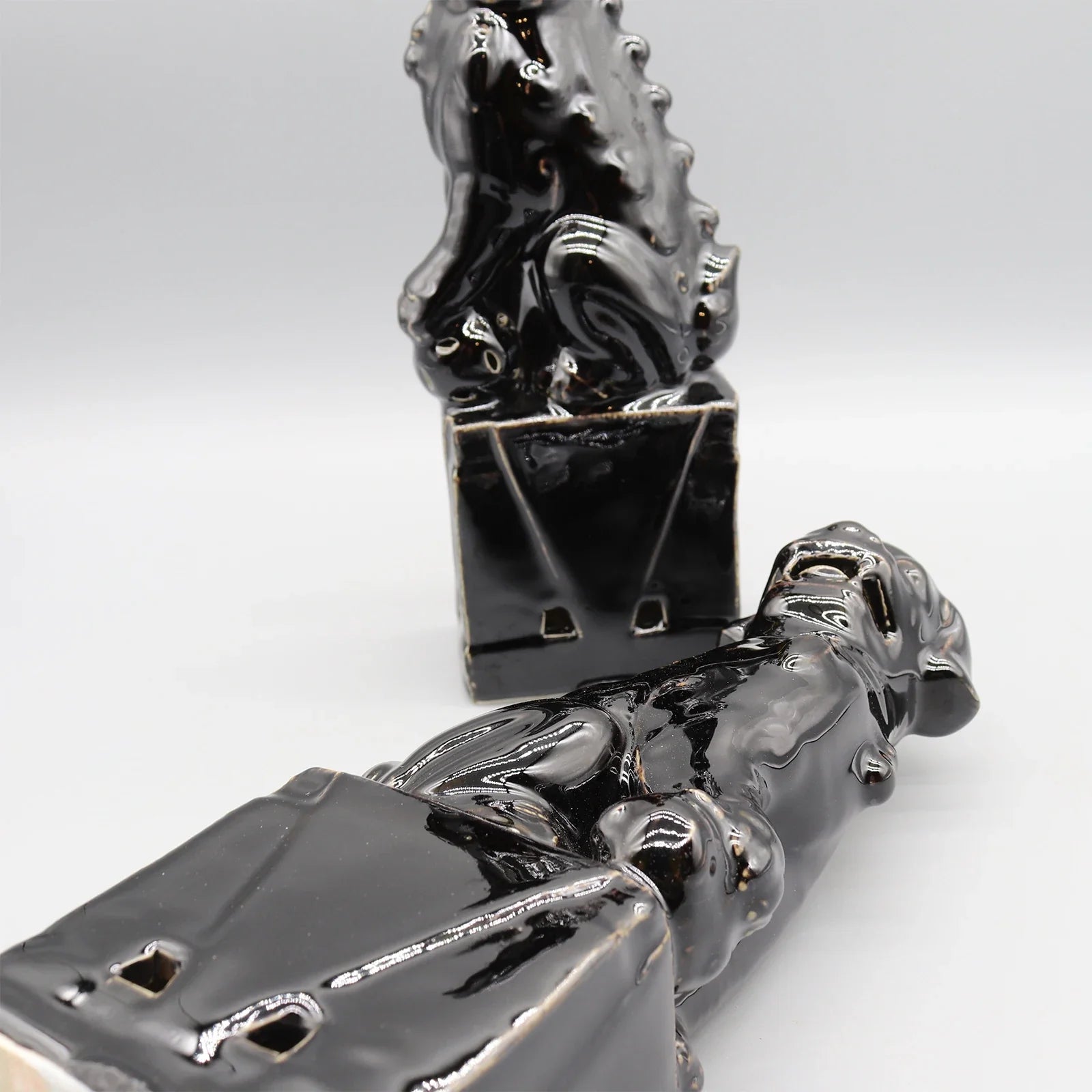 Black ceramic Foo Dogs luxury Chinese guardian lions.