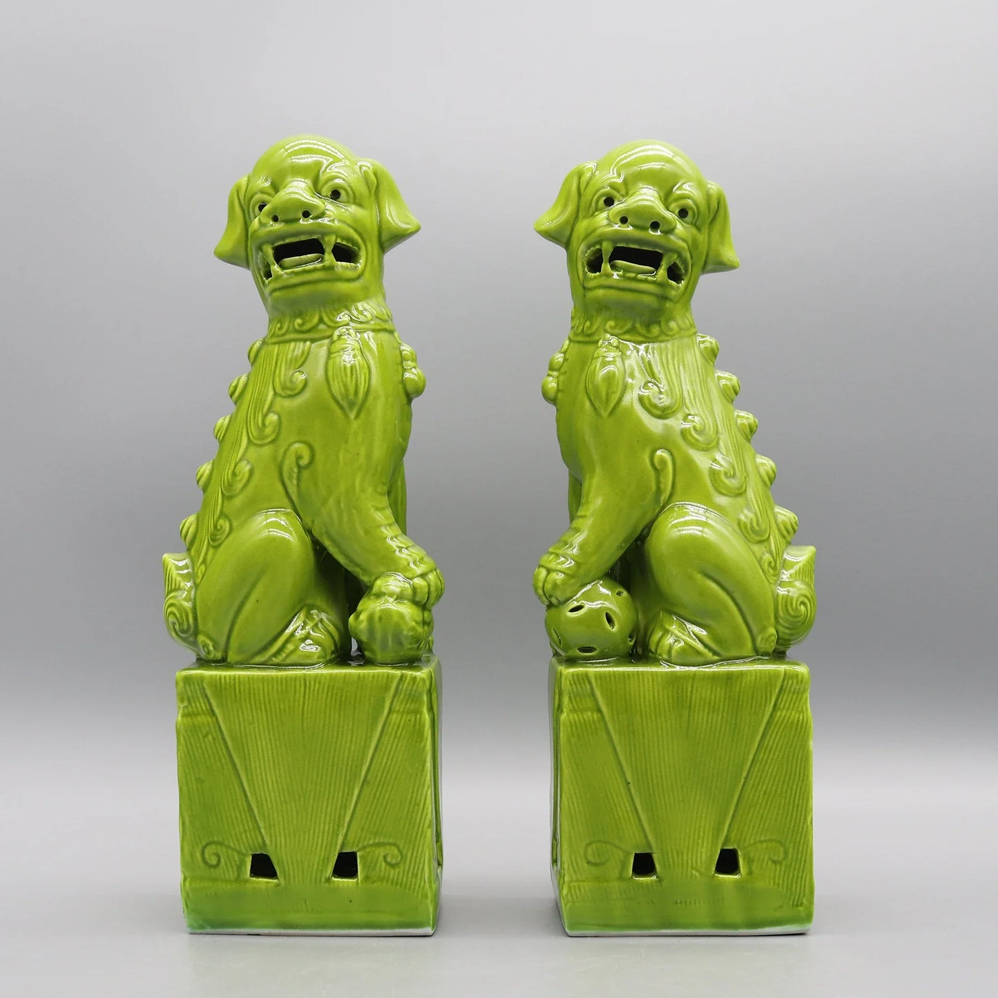 Green ceramic Foo Dogs pair Feng Shui home accents.
