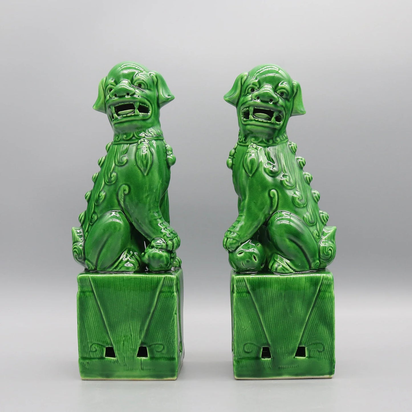 Glossy dark green Foo Dogs pair ceramic sculptures.