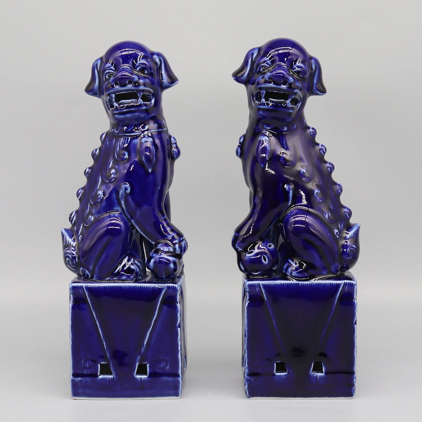 Purple Foo Dogs pair ceramic lion sculptures.