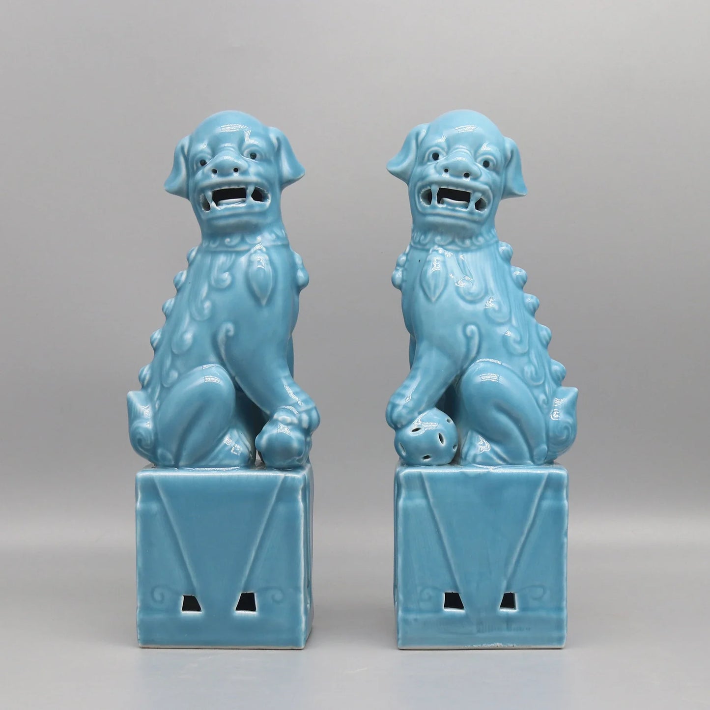 Turquoise ceramic Foo Dogs Feng Shui protective pair.