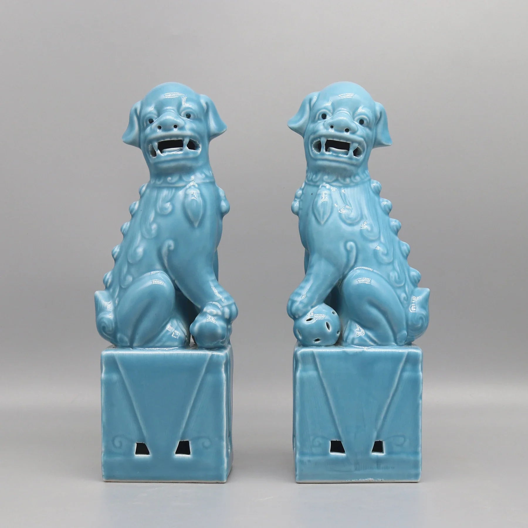 Turquoise ceramic Foo Dogs Feng Shui protective pair.
