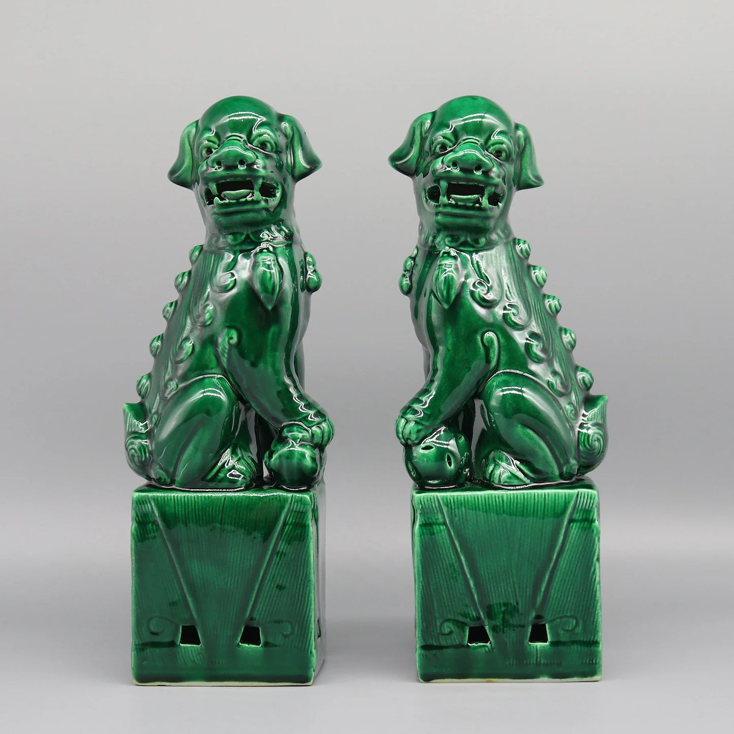 Pair of ceramic Foo Dogs Feng Shui guardian lions décor.