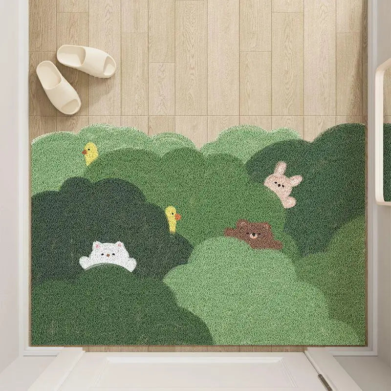 Cute animal and plant themed door mat with green bush pattern for entryway decor.