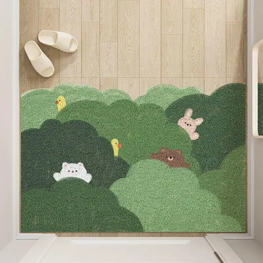 Cute animal and plant themed door mat with green bush pattern for entryway decor.