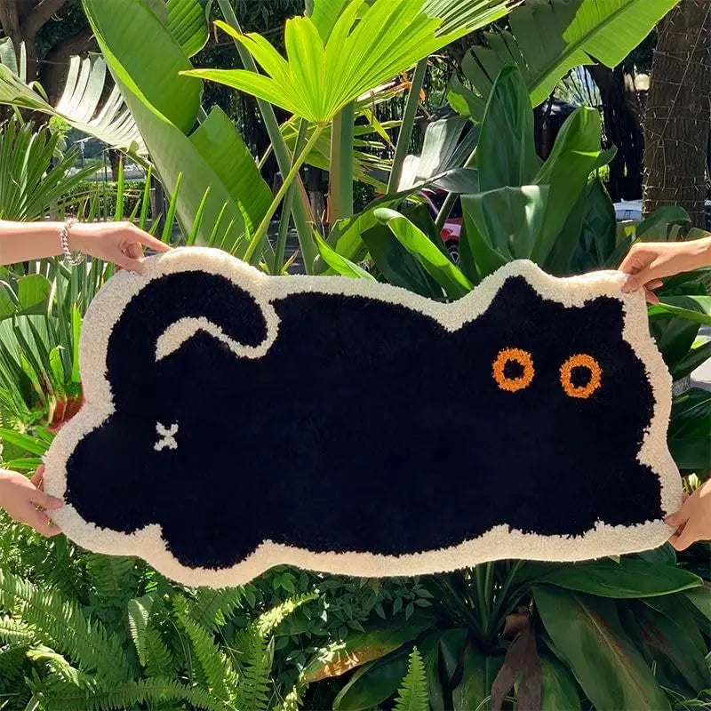 Non-slip absorbent cat-shaped rug for bathroom and bedroom.
