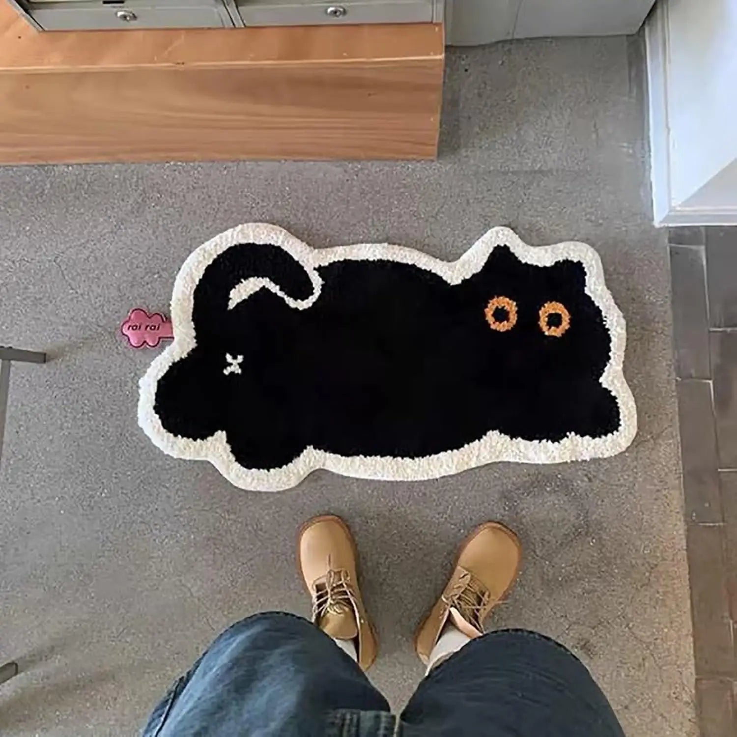Playful cartoon cat bathroom rug with TPR backing.