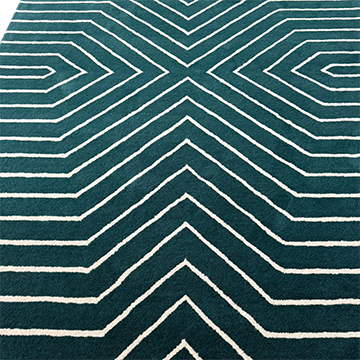 Dark teal geometric hand-tufted wool rug with linear pattern.