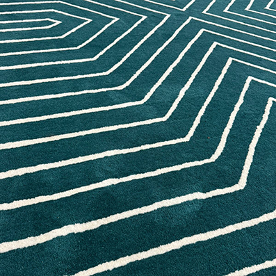 Premium New Zealand wool rug in dark teal for modern interiors.