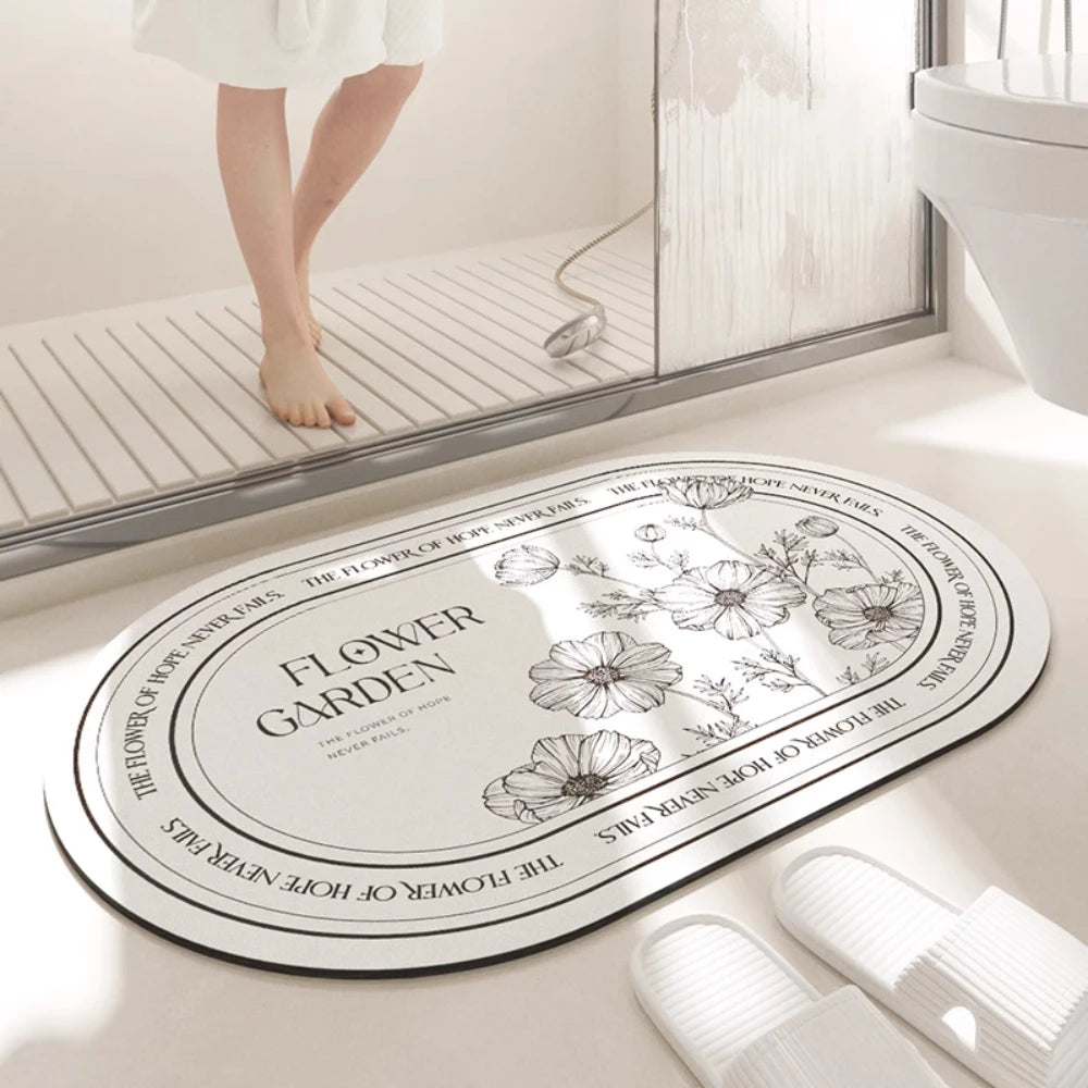 Oval design diatom mud quick-dry bathroom mat.