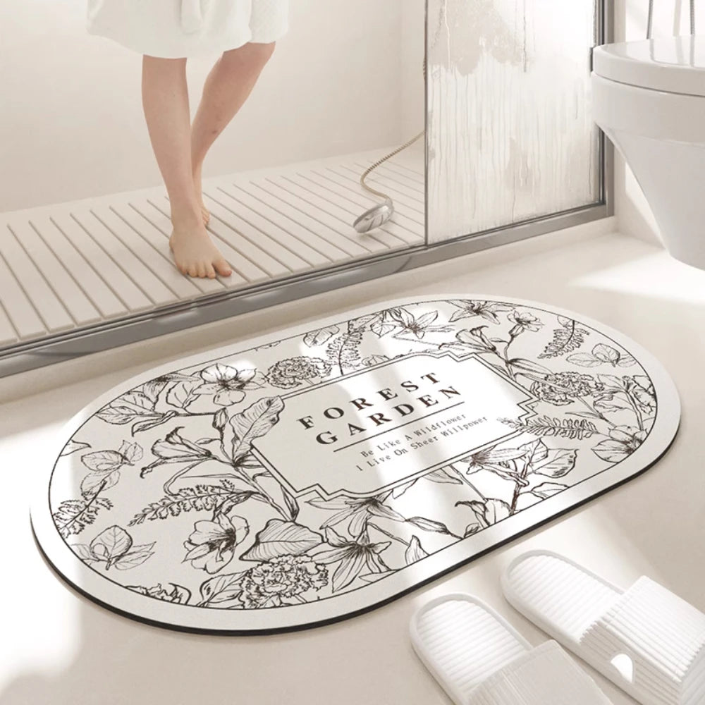 Oval non-slip water-absorbent door mat for kitchen.