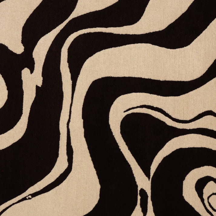 Beige and black modern area rug made with 100% natural New Zealand wool.