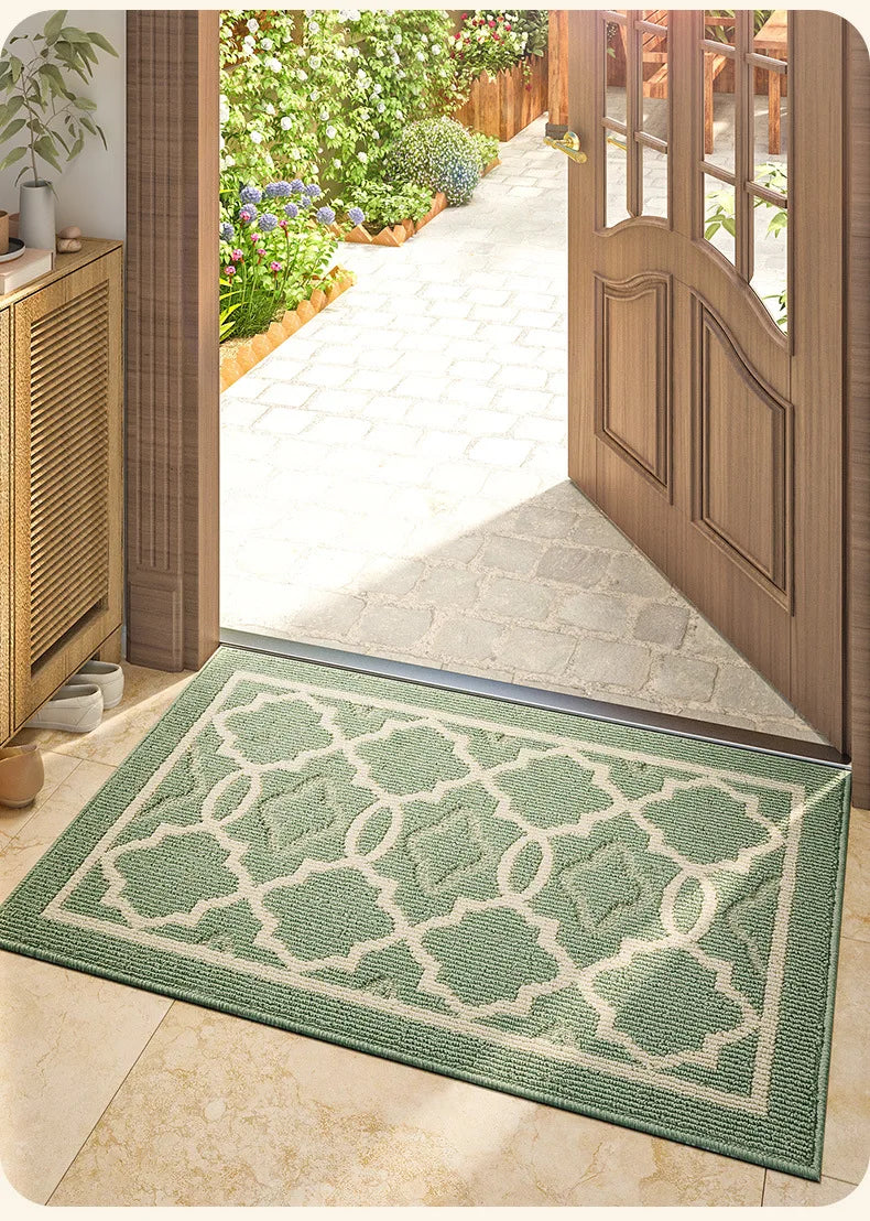 Green geometric pattern outdoor rug.