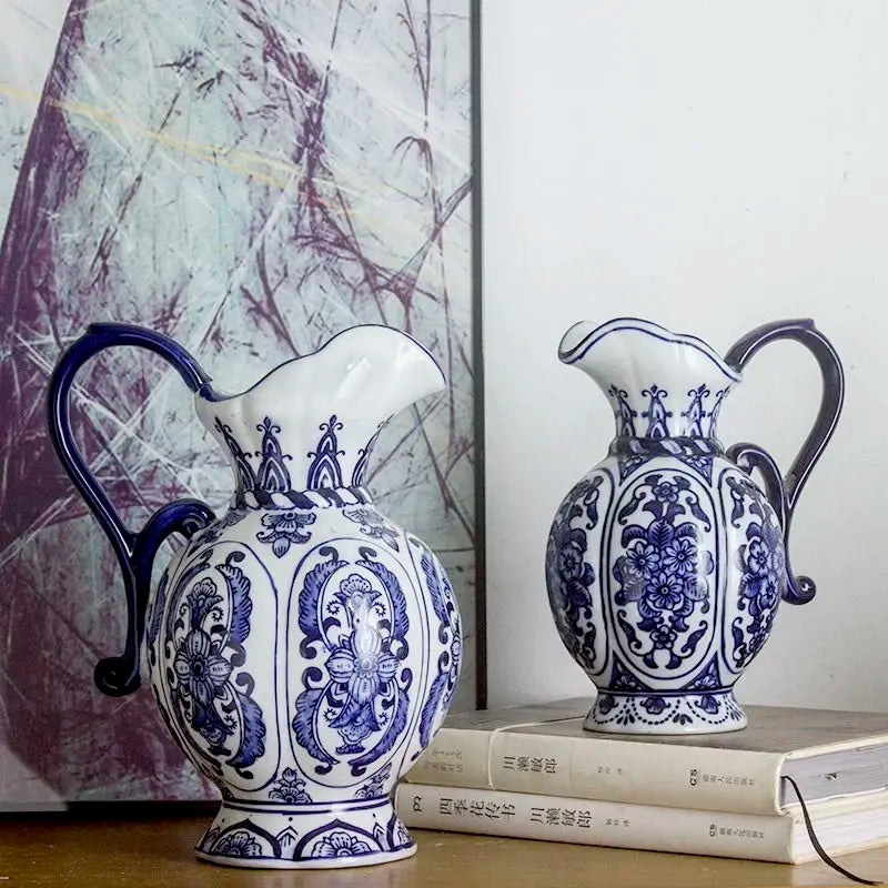 Blue and white porcelain flower vase on display table.