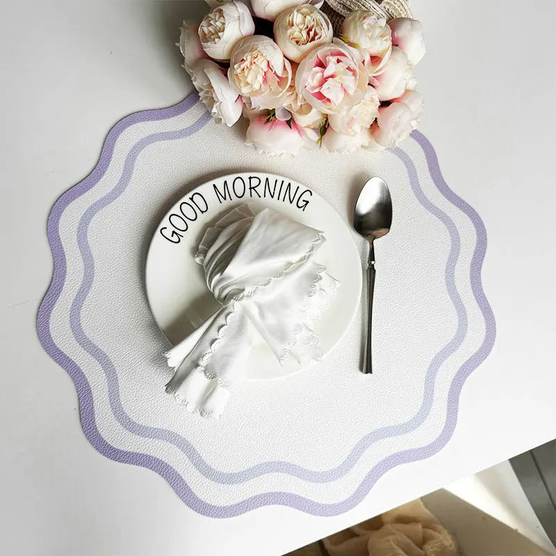 Purple irregular-shaped faux leather table mat close-up.