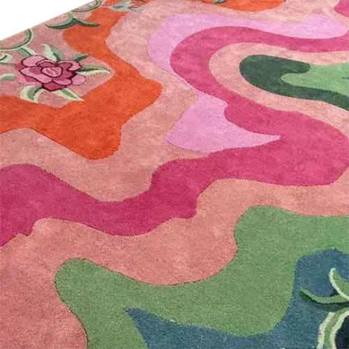 Bright and colorful Floral Wavefront Hand Tufted Area Rug showcasing abstract waves in pink, orange, green, and floral details. Perfect wool rug for adding a pop of color to a living room or dining room. Ideal size for living room rugs 8x10.