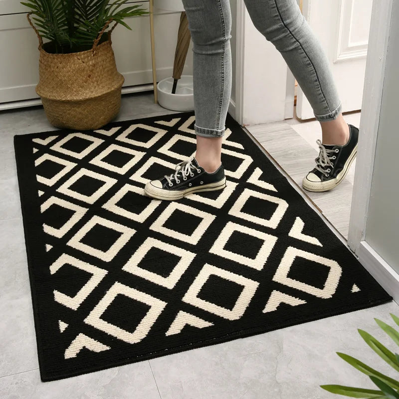 Minimalist checkered door mat in black and white.