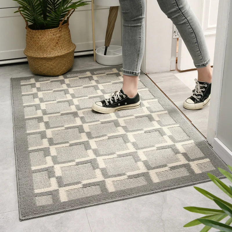 Geometric anti-slip door mat with durable stitching.